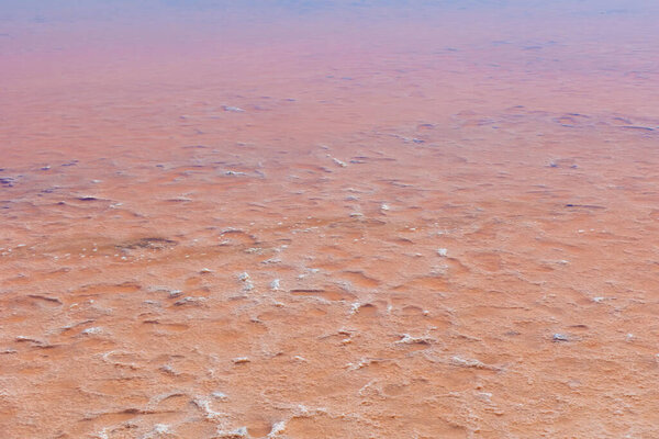 Pink color water salt lake natural landscape background