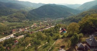 4K Aerial Footage Panoramic View of the Drvengrad, traditional wooden village in Serbia