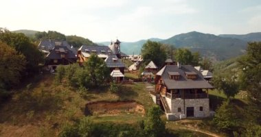 4K Aerial Footage Panoramic View of the Drvengrad, traditional wooden village in Serbia