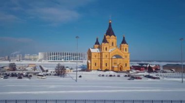 4K Aerial Footage of the Winter View to Alexander Nevsky Church with the background to the snowy Nizhny Novgorod city, Russia