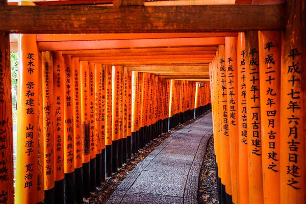 Kyoto, Japan - January 08, 2020: Way from the Thousands of Vermilion Great Torii Gates