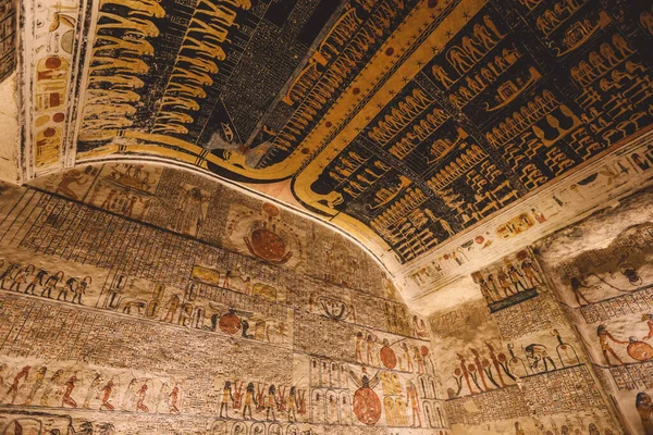 Ancient Egyptian Paintings on the Colorful Ceiling of the Valley of the Kings in Luxor, Egypt