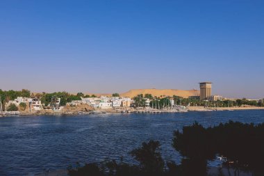 Aswan, Egypt - November 15, 2020: View to the Nile River Panoramic View with Ships and Boats from the Aswan Riverside