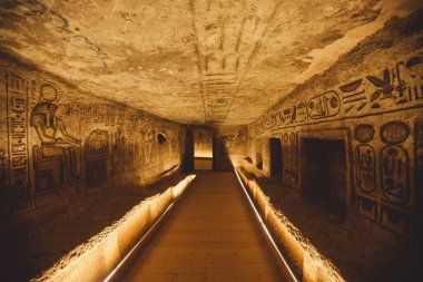 Interior View to the Great Temple at Abu Simbel with Ancient Egyptian Pillars and Drawing on the Walls, Egypt