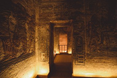 Interior View to the Great Temple at Abu Simbel with Ancient Egyptian Pillars and Drawing on the Walls, Egypt