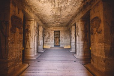 Interior View to the Great Temple at Abu Simbel with Ancient Egyptian Pillars and Drawing on the Walls, Egypt