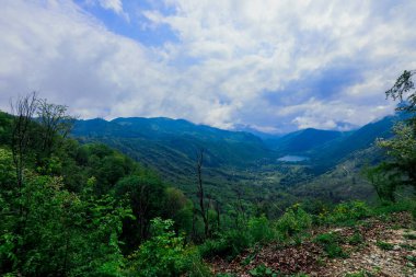 Panoramic View to the Blue Mountain Lake among the Green Forest Trees in the heart of Bosnia and Herzegovina