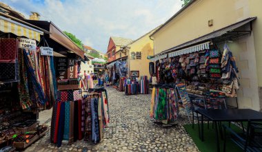 Mostar, Bosnia and Herzegovina - May 12, 2022: Old City in city center of Mostar with the Colorful Traditional Souvenirs  