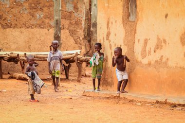 Larabanga, Ghana - August 25, 2016: African Children playing on the Larabanga Village Street
