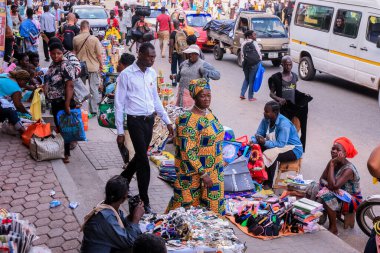 Accra, Ghana - April 06, 2022: Local African Street Woman Seller on the  Accra street