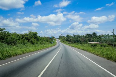 Scenic African Road under the Blue Sky in Ghana, West Africa