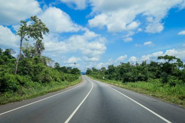 Scenic African Road under the Blue Sky in Ghana, West Africa
