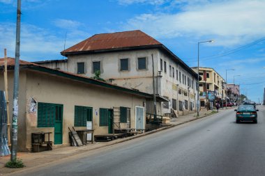 Kumasi, Ghana - April 06, 2022: Crowded African Road with Local Ghana People in Kumasi city