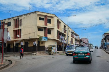 Kumasi, Ghana - April 06, 2022: Crowded African Road with Local Ghana People in Kumasi city