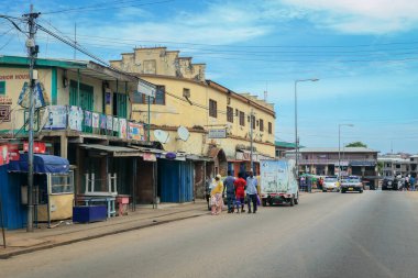 Kumasi, Ghana - April 06, 2022: Crowded African Road with Local Ghana People in Kumasi city