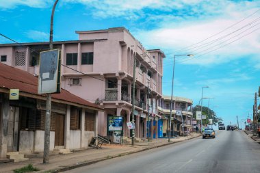 Kumasi, Ghana - April 06, 2022: Crowded African Road with Local Ghana People in Kumasi city