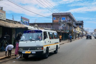 Kumasi, Ghana - April 06, 2022: Crowded African Road with Local Ghana People in Kumasi city