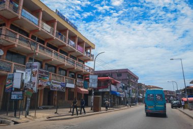 Kumasi, Ghana - April 06, 2022: Crowded African Road with Local Ghana People in Kumasi city