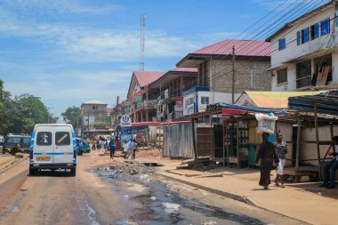 Kumasi, Ghana - April 06, 2022: Crowded African Road with Local Ghana People in Kumasi city