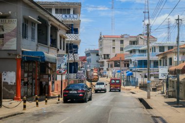 Kumasi, Ghana - April 06, 2022: Crowded African Road with Local Ghana People in Kumasi city