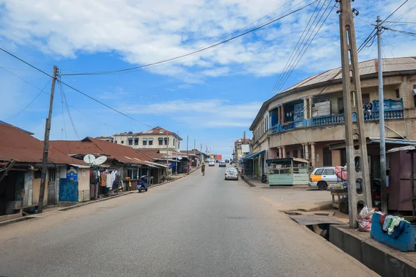 Kumasi, Ghana - April 06, 2022: Crowded African Road with Local Ghana People in Kumasi city