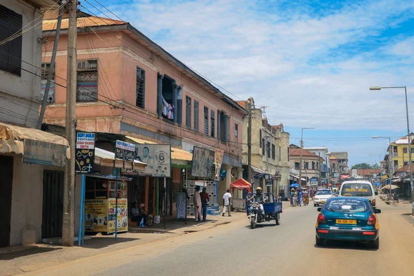 Kumasi, Ghana - April 06, 2022: Crowded African Road with Local Ghana People in Kumasi city