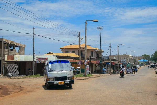 Kumasi, Ghana - April 06, 2022: Crowded African Road with Local Ghana People in Kumasi city