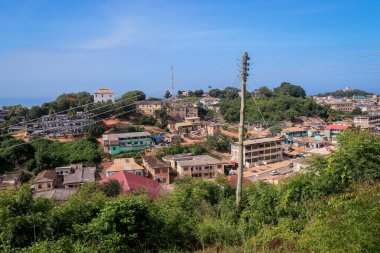 Panoramic View to the Cape Coast Downtown Houses among Green Trees in Ghana, West Africa 