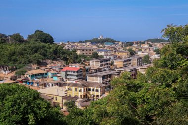 Panoramic View to the Cape Coast Downtown Houses among Green Trees in Ghana, West Africa 