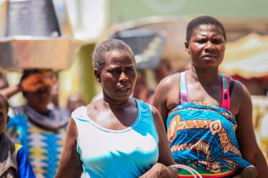 Elmina, Ghana - April 15, 2022: Local African People near the Elmina Market in Ghana