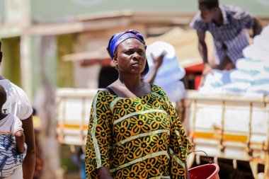 Elmina, Ghana - April 15, 2022: Local African People near the Elmina Market in Ghana