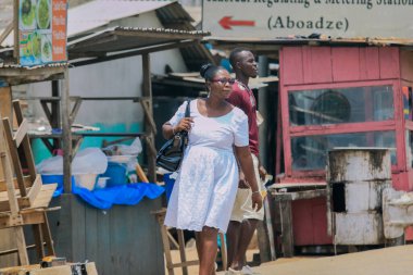 Elmina, Ghana - April 15, 2022: Local African People near the Elmina Market in Ghana