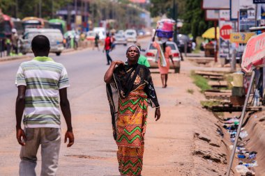 Elmina, Ghana - April 15, 2022: Local African People near the Elmina Market in Ghana