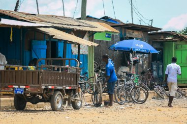 Elmina, Ghana - April 15, 2022: Local African People near the Elmina Market in Ghana