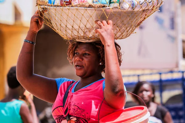 Elmina, Ghana - April 15, 2022: Local African People near the Elmina Market in Ghana