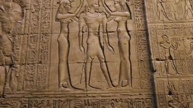 Wall Paintings Of An Ancient Civilization In The Temple Of Edfu, Egypt