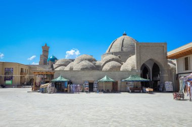 Bukhara, Uzbekistan - May 15, 2022: Interesting View to the Entrance of an Old Bukhara Market with the Clay Round Roofs
