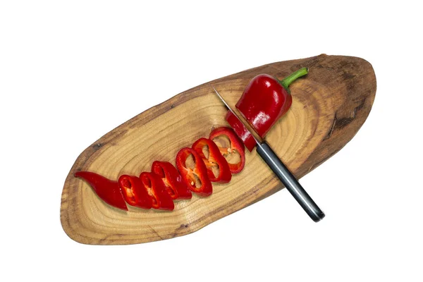 木桌上的红片木瓜和刀 — 图库照片