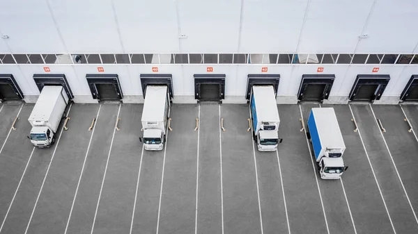Small Trucks Unloading Distribution Hub Aerial View — Stockfoto
