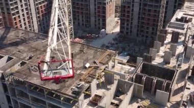 Aerial view of construction site. People working on construction site