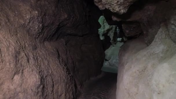 Speleology, cave, dungeon, dark tunnel, underground excavations. — Stock video