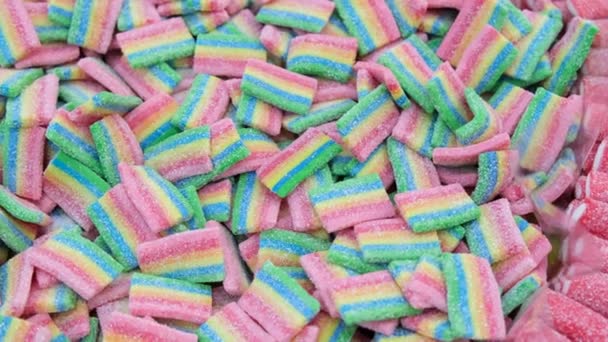 Colección mixta de dulces de colores, de cerca — Vídeos de Stock
