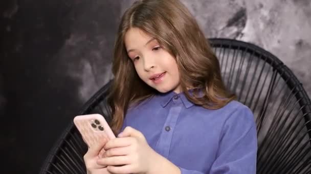 Little Girl Makes Photo With Her Modern Phone — Stockvideo