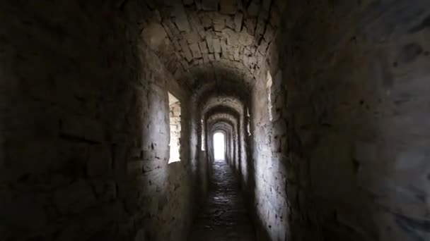 Secret corridors in the dungeons of Bran Castle, Romania. Tunnels in the medieval castle — Stock video