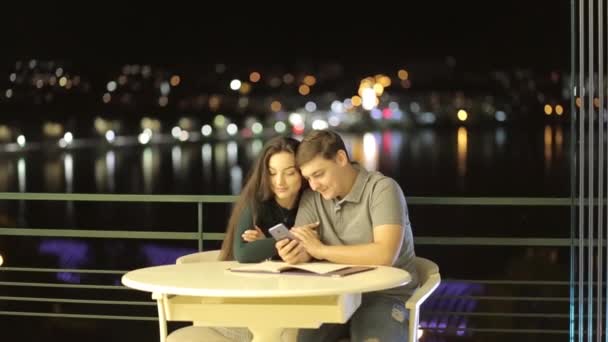 A romantic couple having fun in a cafe, in love with Valentines Day — Video Stock