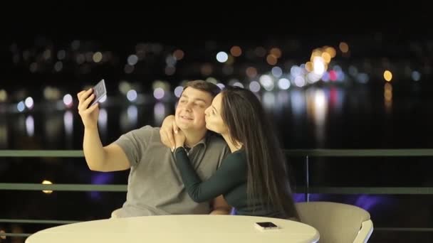 A romantic couple having fun in a cafe, in love with Valentines Day — Video Stock