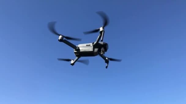 Drone flying against blue sky. 4k video — Stockvideo