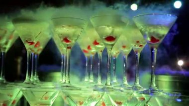 Champagne from cherry and steam with dry ice, champagne with smoke