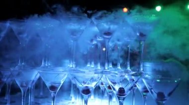 Champagne from cherry and steam with dry ice, champagne with smoke