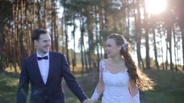 Beautiful Sunset Wedding. Bride and Groom at Sunset